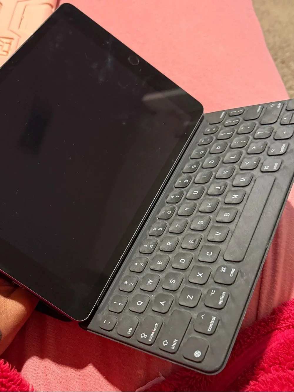 Apple iPad Tablet in Black with Blue Screen
